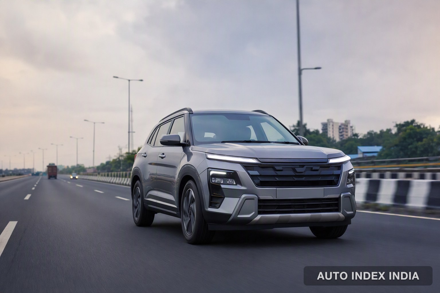An SUV on a highway with driver assistance sensors active
