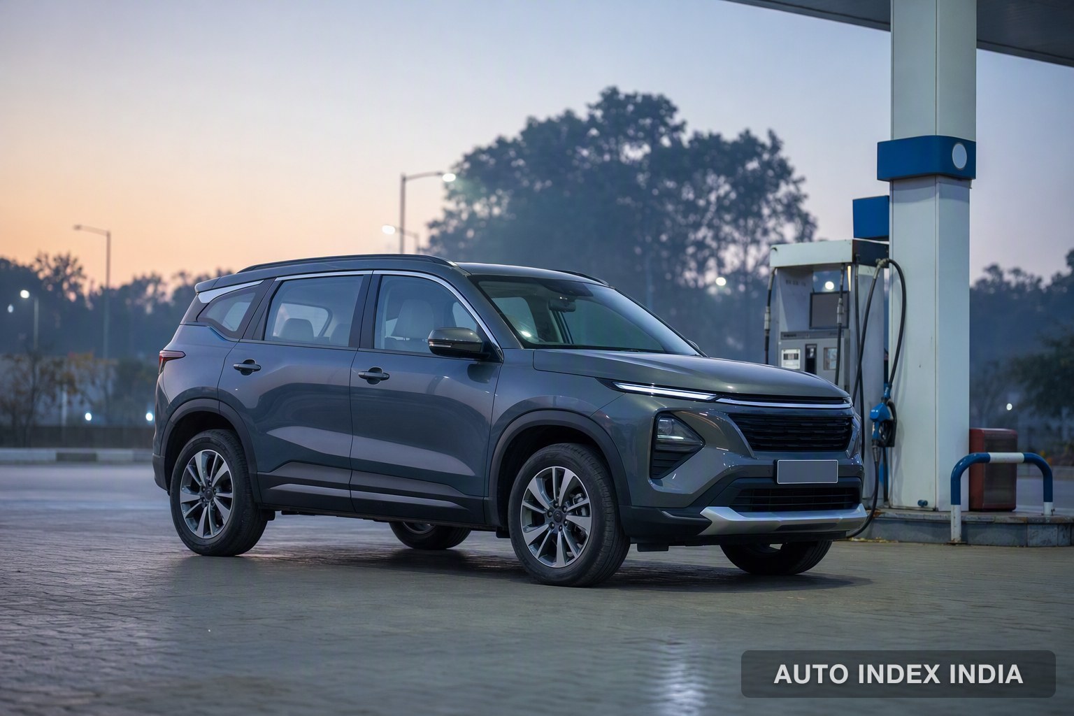 A mid-size SUV at a fuel pump